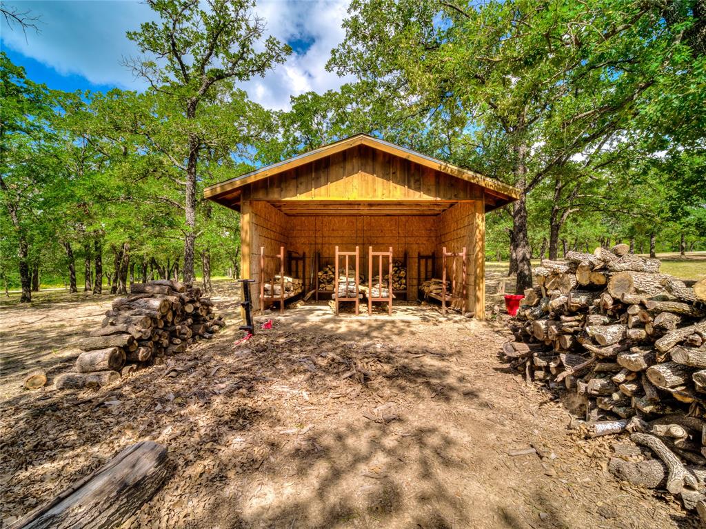 2197 Netherly Lane Forestburg, TX 76239 - Photo 33 of 40 a view of a house with backyard porch and sitting area