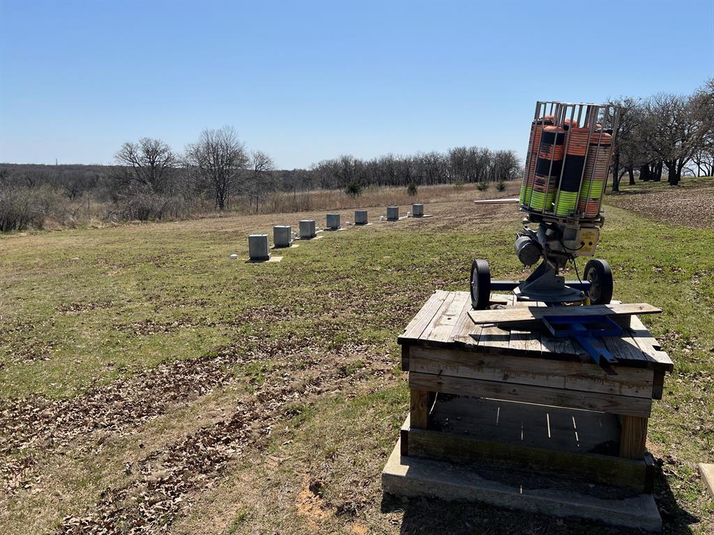 2197 Netherly Lane Forestburg, TX 76239 - Photo 34 of 40 a view of a yard with table and chairs