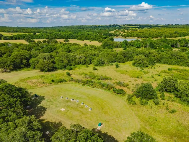 a view of a house with a big yard