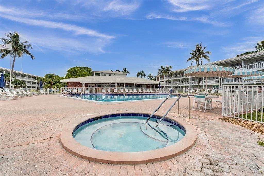 5203 Northeast 24th Terrace, Unit B204 Fort Lauderdale, FL 33308 - Photo 12 of 12 a terrace with outdoor seating and city view