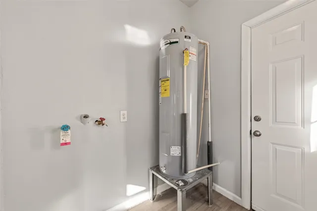 a kitchen with stainless steel appliances a refrigerator and a stove