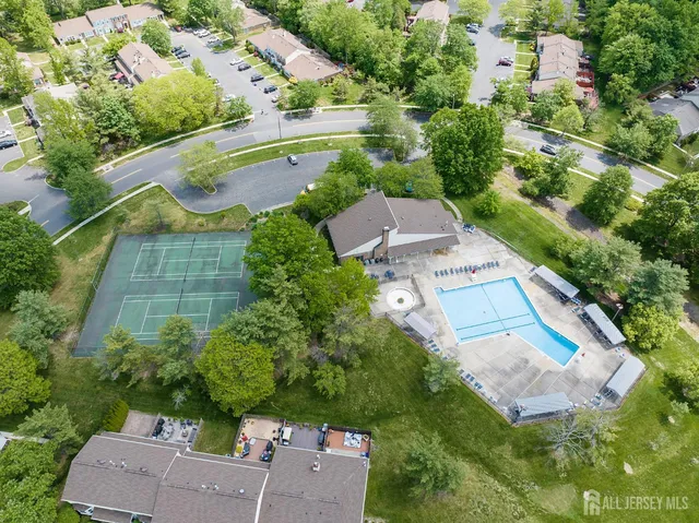 an aerial view of a house with a garden