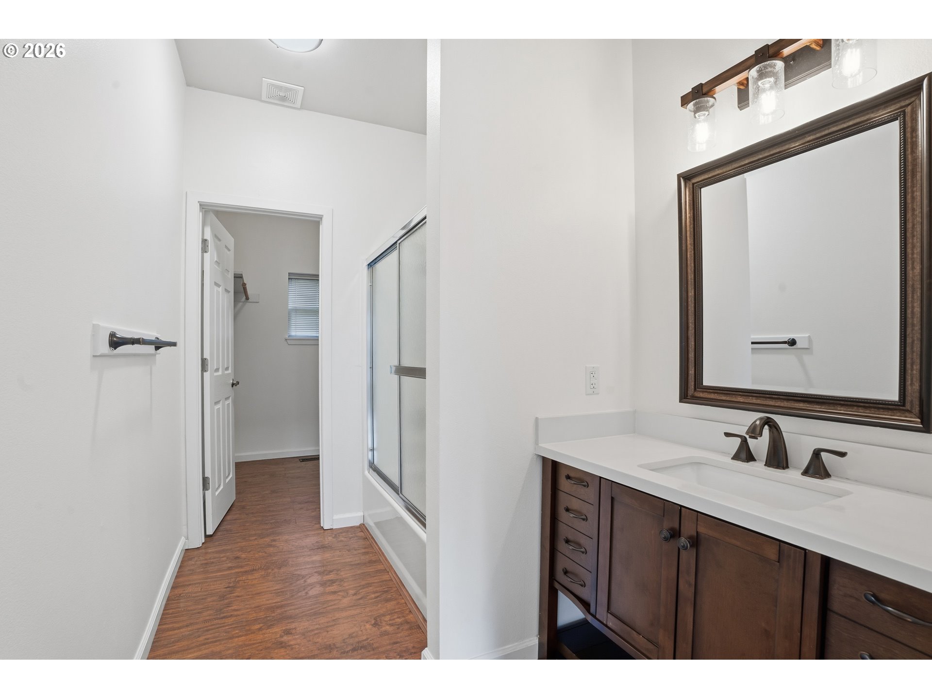 419 Northeast 7th Avenue Camas, WA 98607 - Photo 12 of 27 a bathroom with a sink vanity and a mirror
