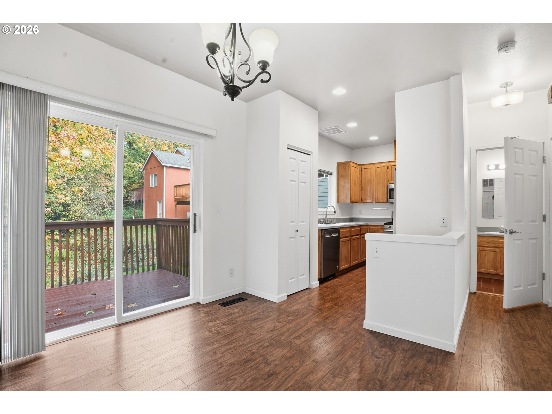 419 Northeast 7th Avenue Camas, WA 98607 - Photo 6 of 27 a view of a kitchen with kitchen island wooden floor and stainless steel appliances