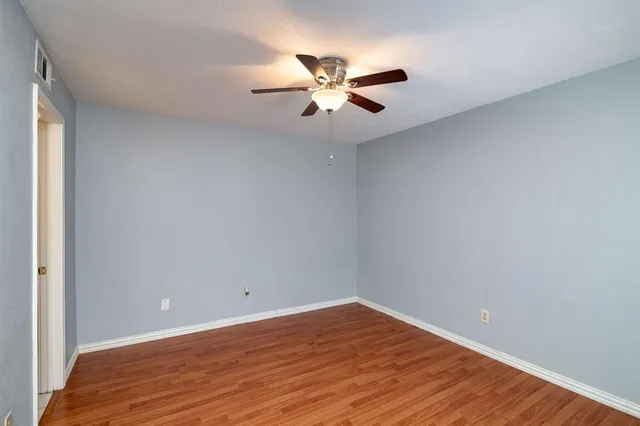 a view of a cars parked in front of a house