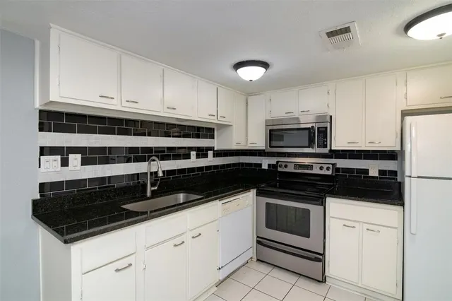 a view of a livingroom with a fireplace