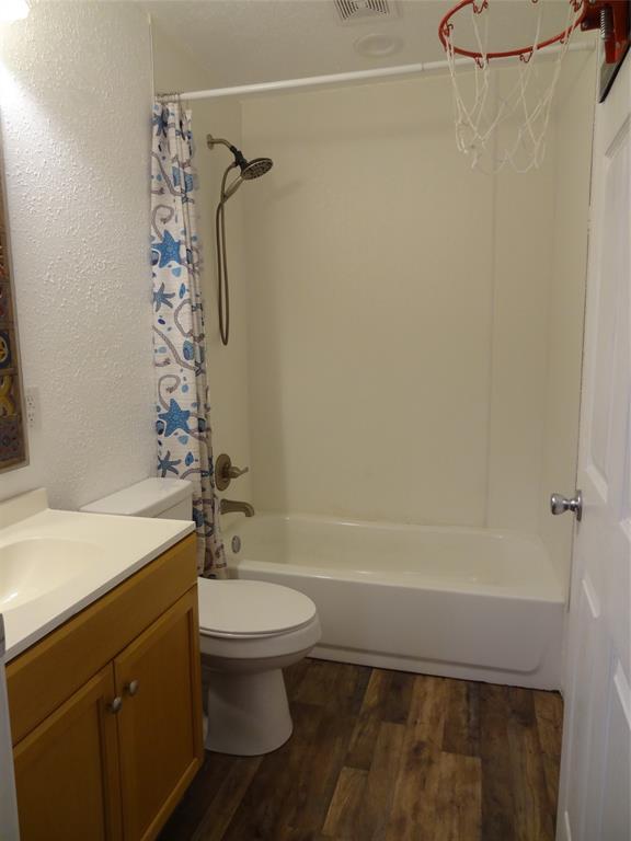 126 Deer Run Road Mabank, TX 75156 - Photo 13 of 20 a bathroom with a sink a toilet and shower