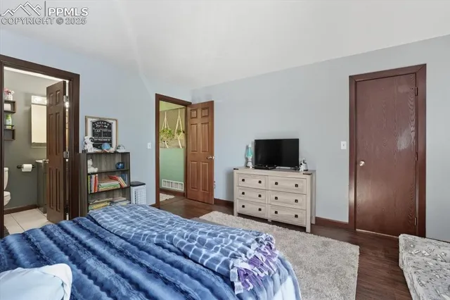 a bedroom with a bed and furniture