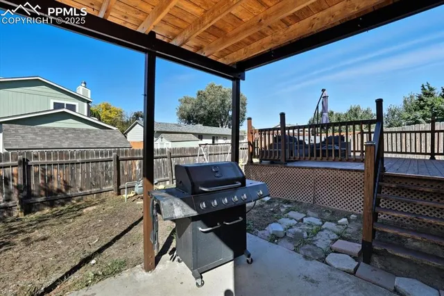 a view of a balcony with chairs