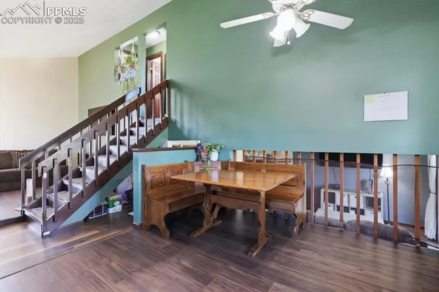 a view of entryway livingroom and hall with wooden floor