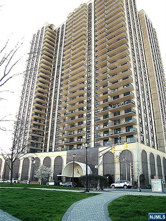 a front view of a building with glass windows