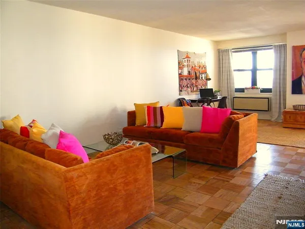 a living room with furniture and a couch
