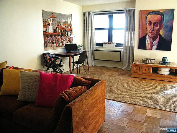 a living room with furniture and window