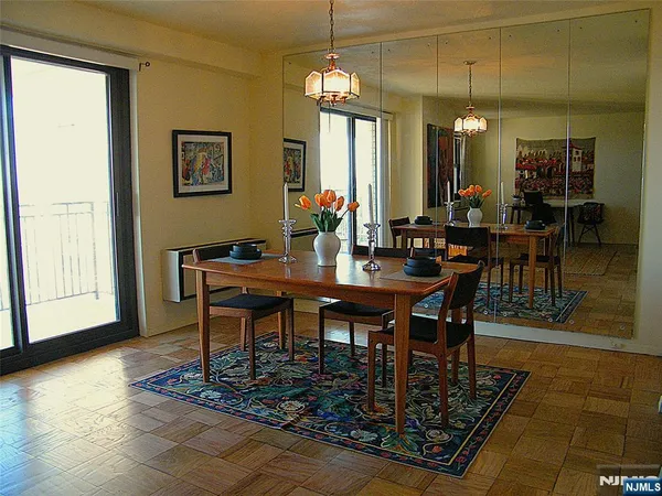 a view of a dining room with furniture
