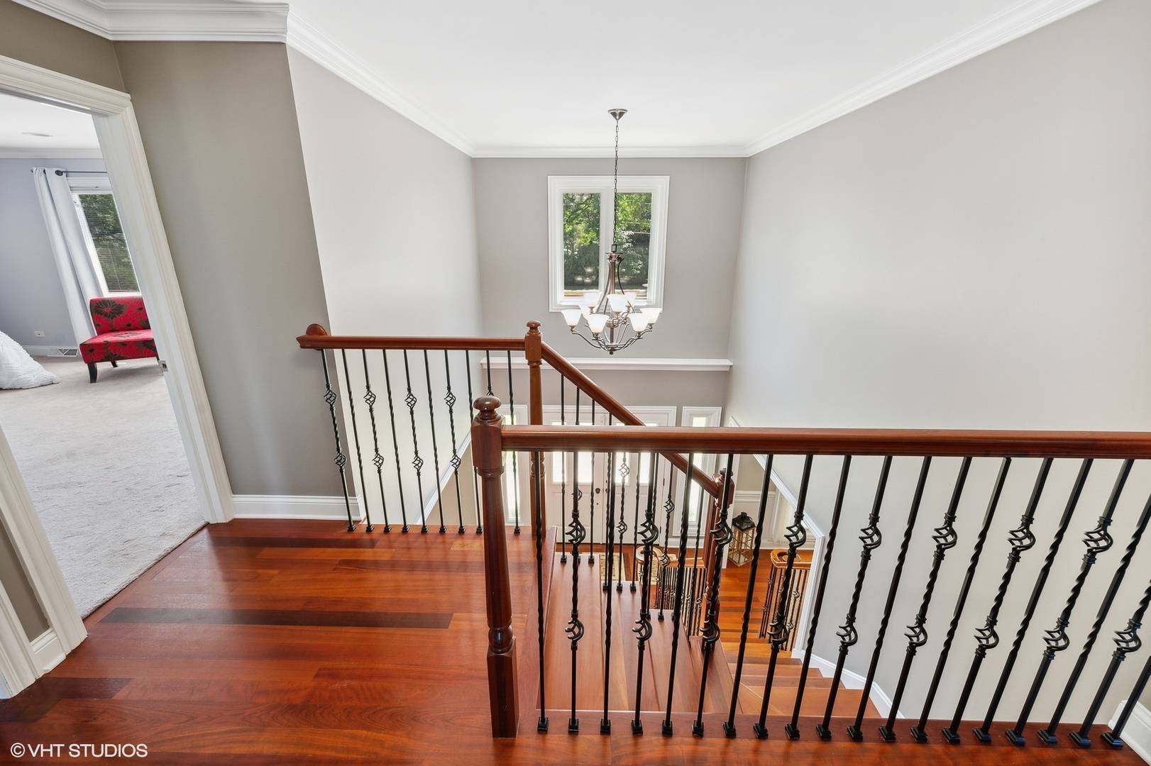 2736 Glenview Road Glenview, IL 60025 - Photo 13 of 31 a view of hallway with stairs and wooden floor