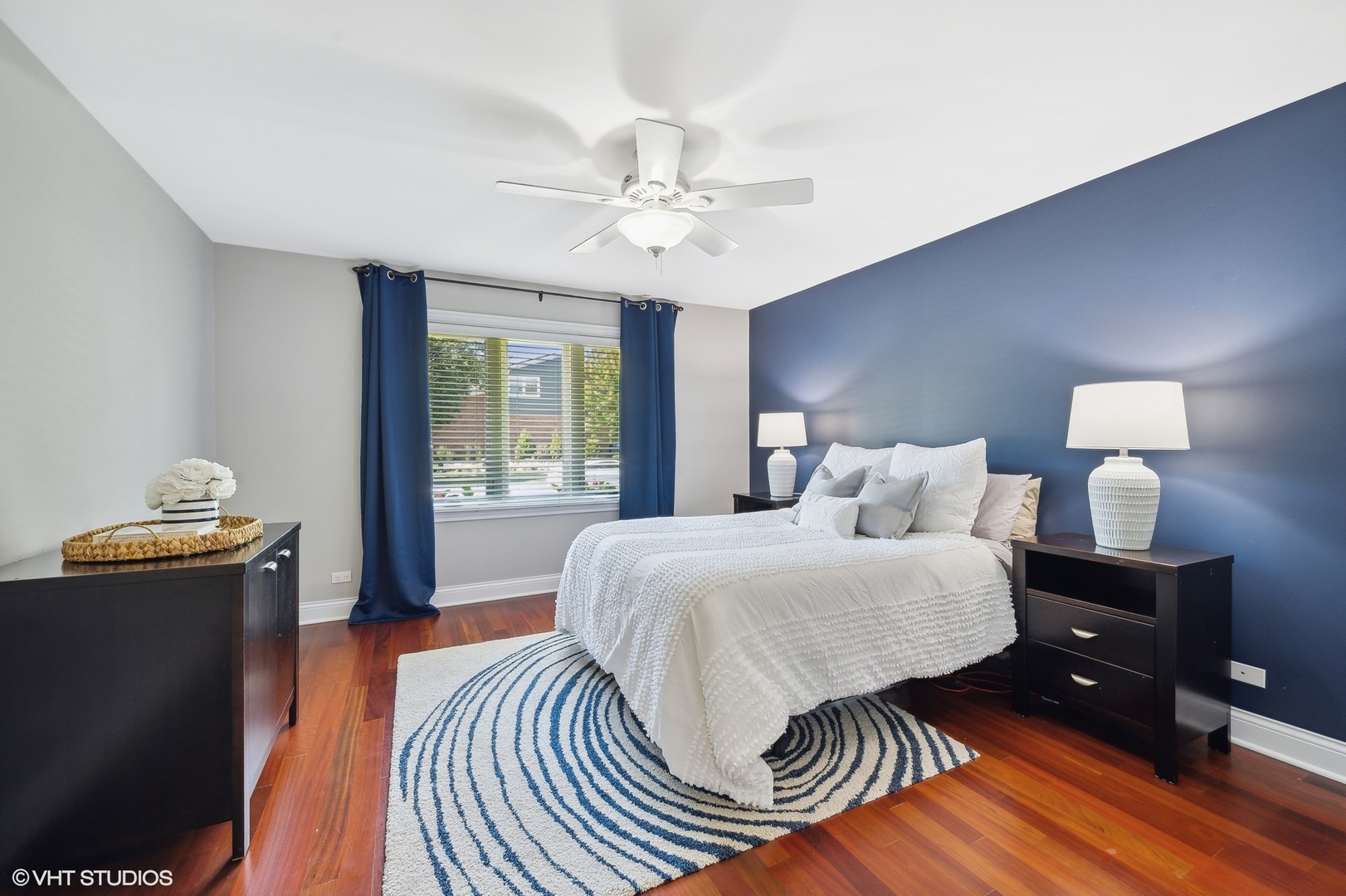 2736 Glenview Road Glenview, IL 60025 - Photo 14 of 31 a spacious bedroom with a bed and wooden floor