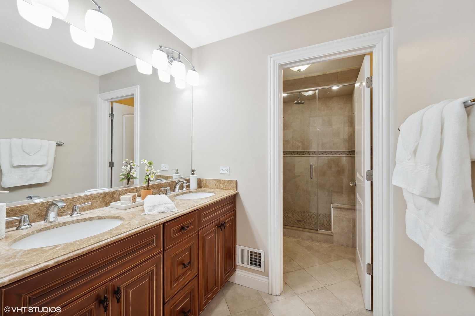2736 Glenview Road Glenview, IL 60025 - Photo 17 of 31 a bathroom with a double vanity sink mirror and double