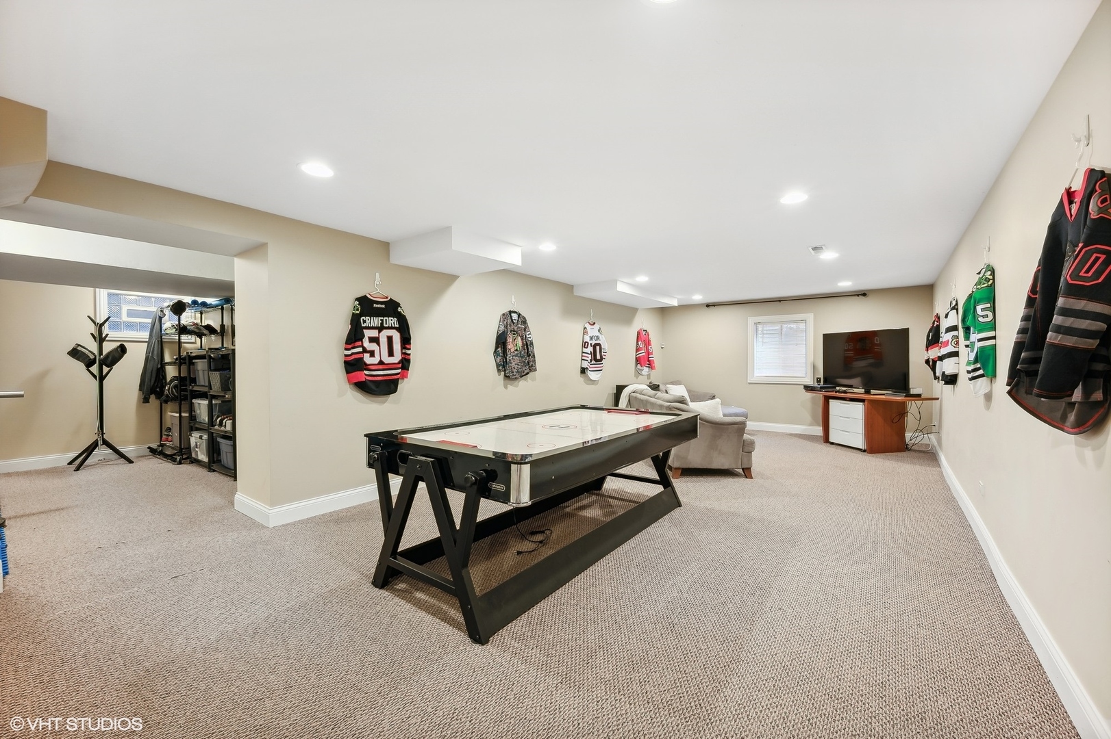 2736 Glenview Road Glenview, IL 60025 - Photo 22 of 31 a living room with furniture pool and a flat screen tv