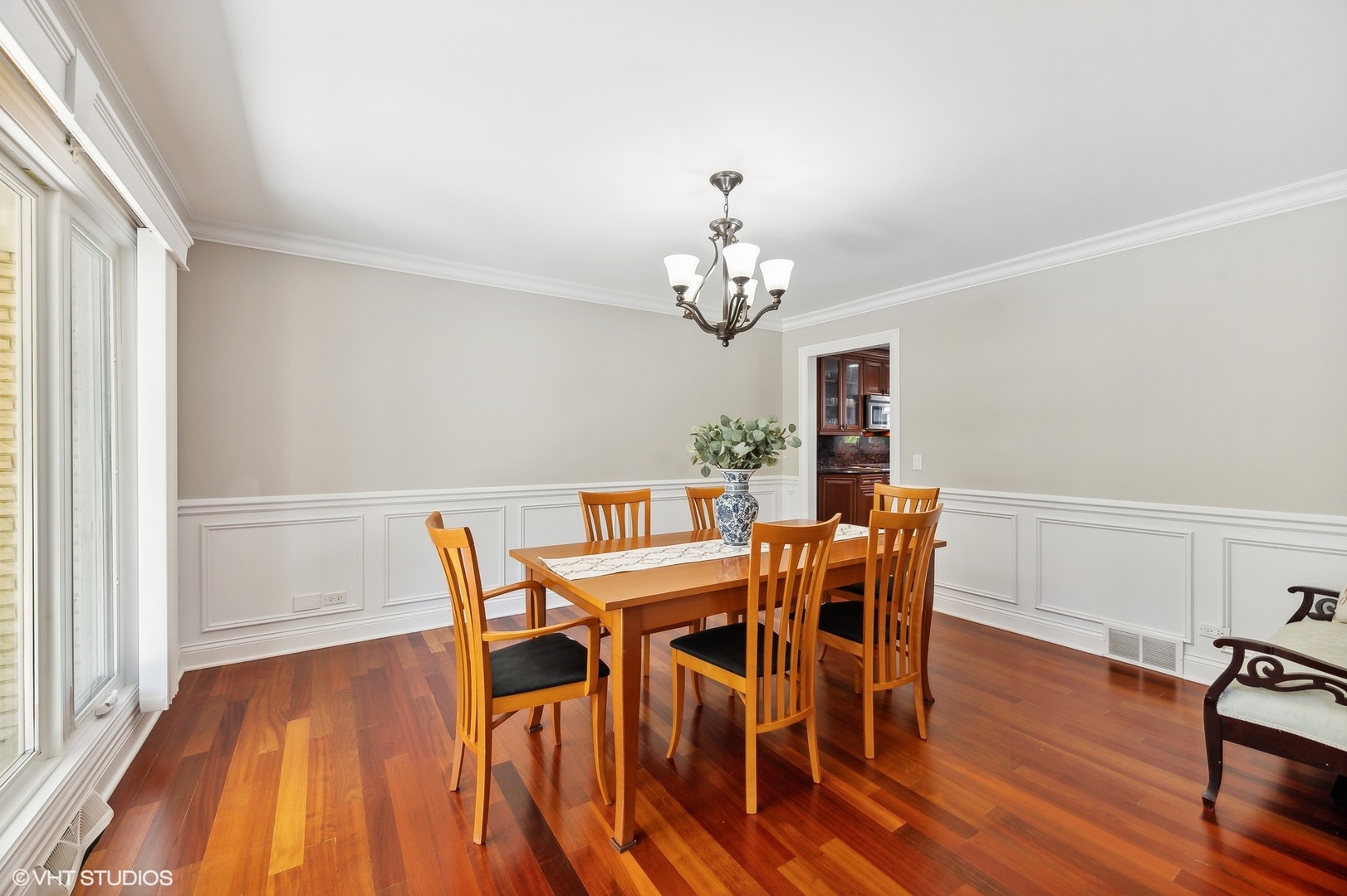 2736 Glenview Road Glenview, IL 60025 - Photo 6 of 31 a view of a dining room with furniture wooden floor and chandelier