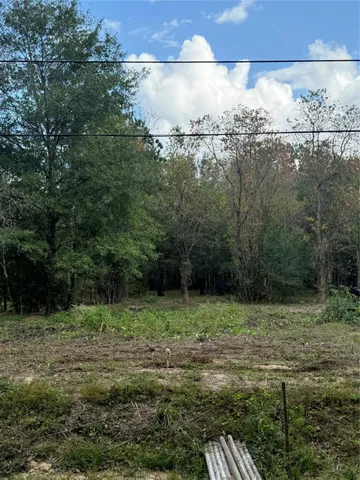 a view of outdoor space and a lake view