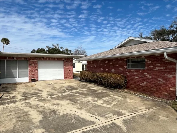 a view of a house with a garage