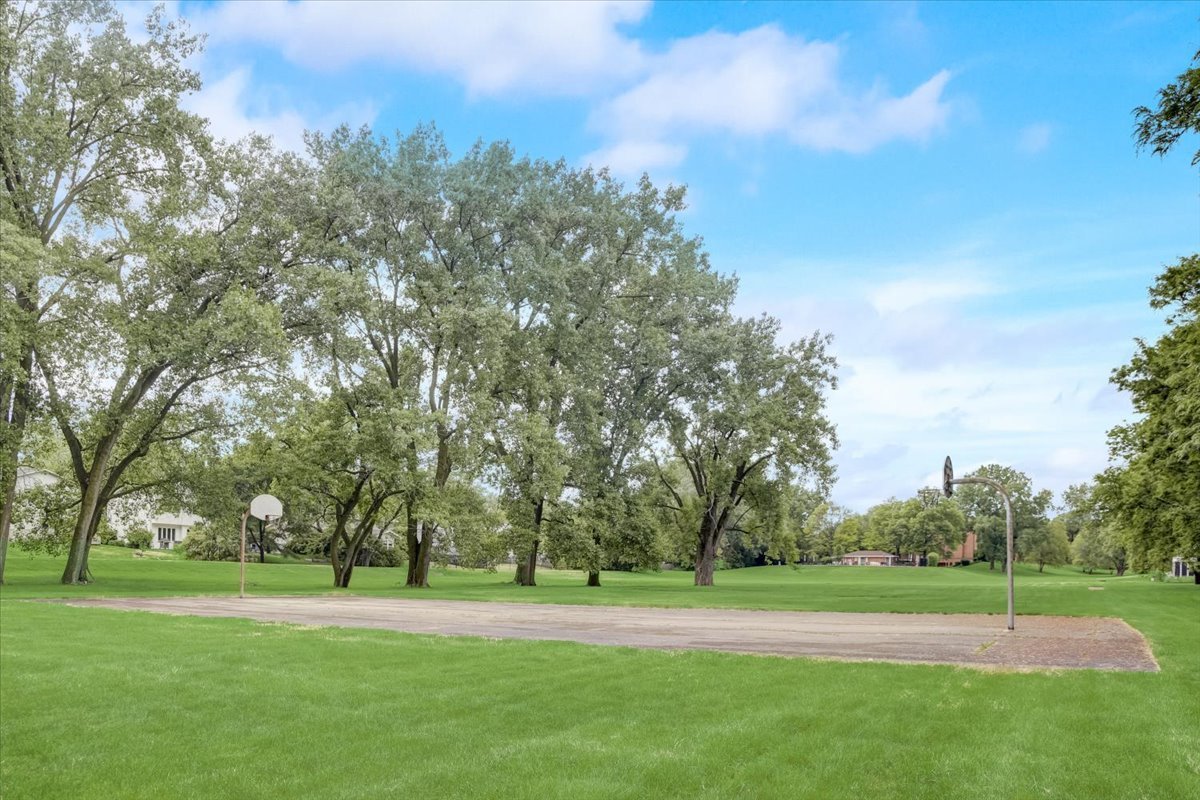 8325 High Point Circle, Unit A Darien, IL 60561 - Photo 35 of 42 a view of a park with trees in the background