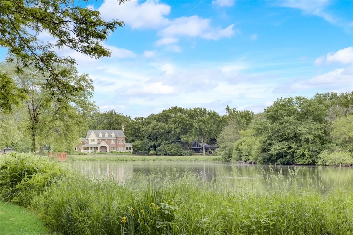 8325 High Point Circle, Unit A Darien, IL 60561 - Photo 37 of 42 a view of a large body of water surrounded by trees