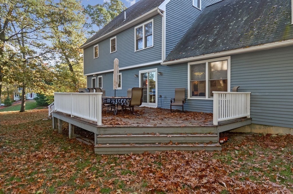 2 Marions Way Georgetown, MA 01833 - Photo 14 of 29 a view of a house with a yard and sitting area