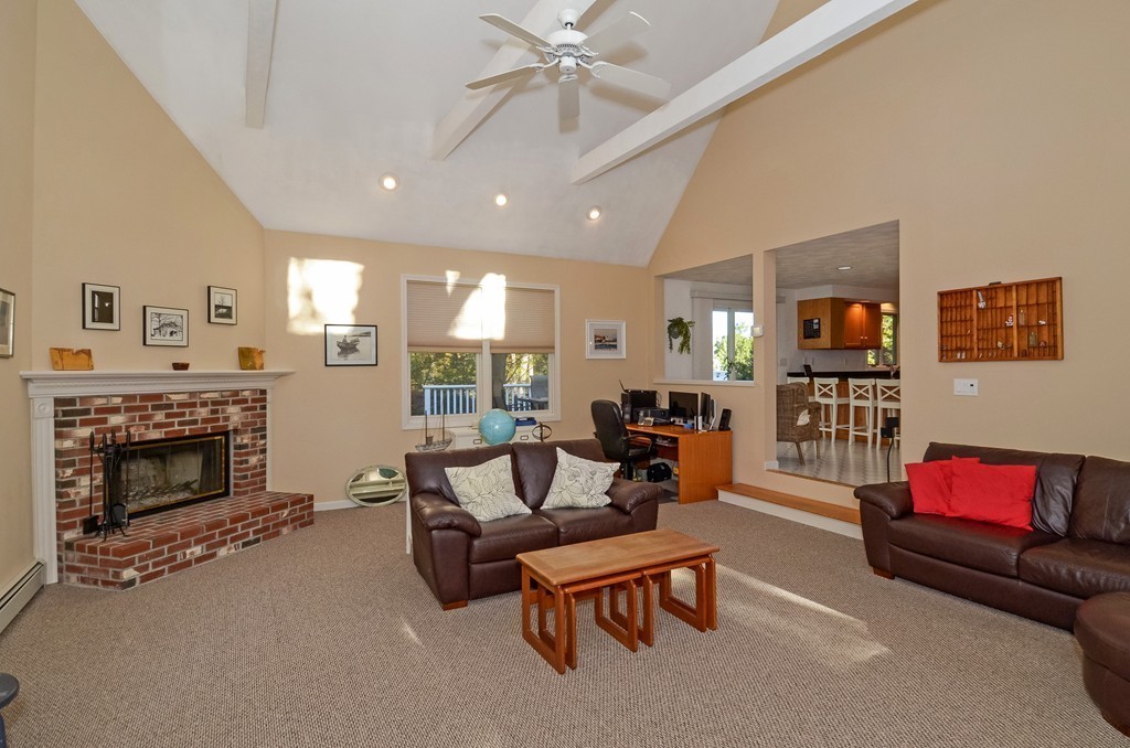 2 Marions Way Georgetown, MA 01833 - Photo 17 of 29 a living room with furniture and a fireplace