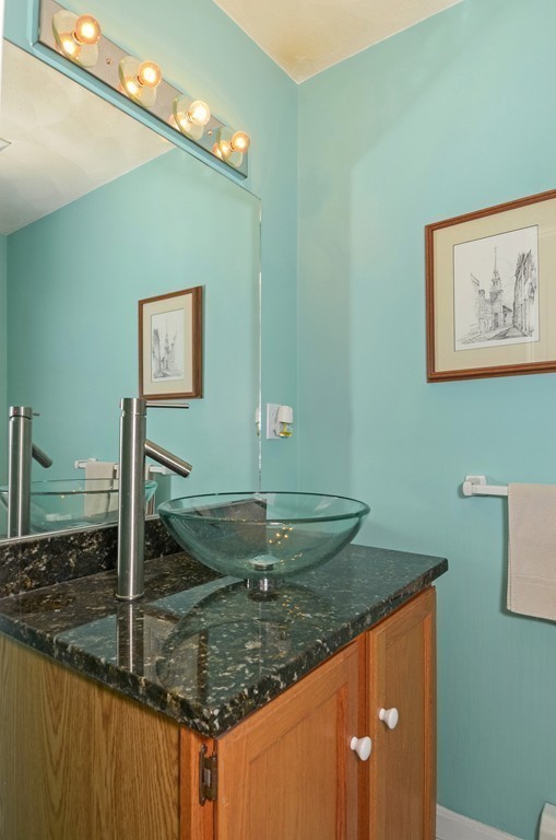 2 Marions Way Georgetown, MA 01833 - Photo 18 of 29 a bathroom with a granite countertop sink and a mirror