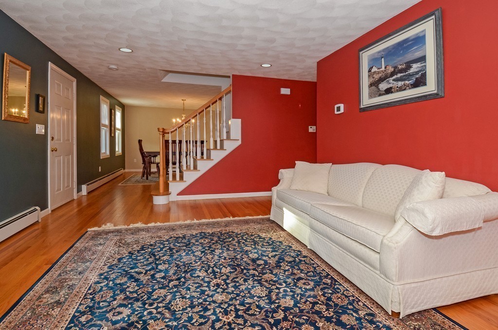 2 Marions Way Georgetown, MA 01833 - Photo 4 of 29 a living room with furniture and a rug