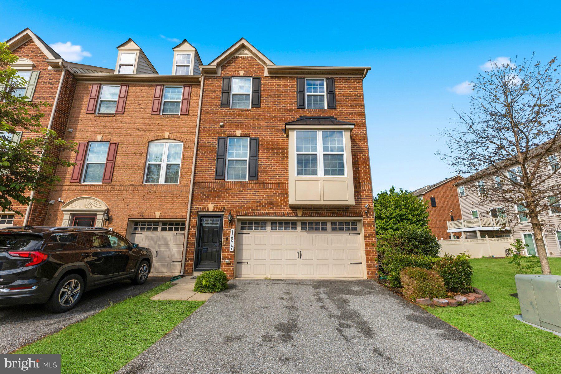 12217 Timberlake Place Waldorf, MD 20601 - Photo 1 of 34 Charming brick townhouse with curb appeal.