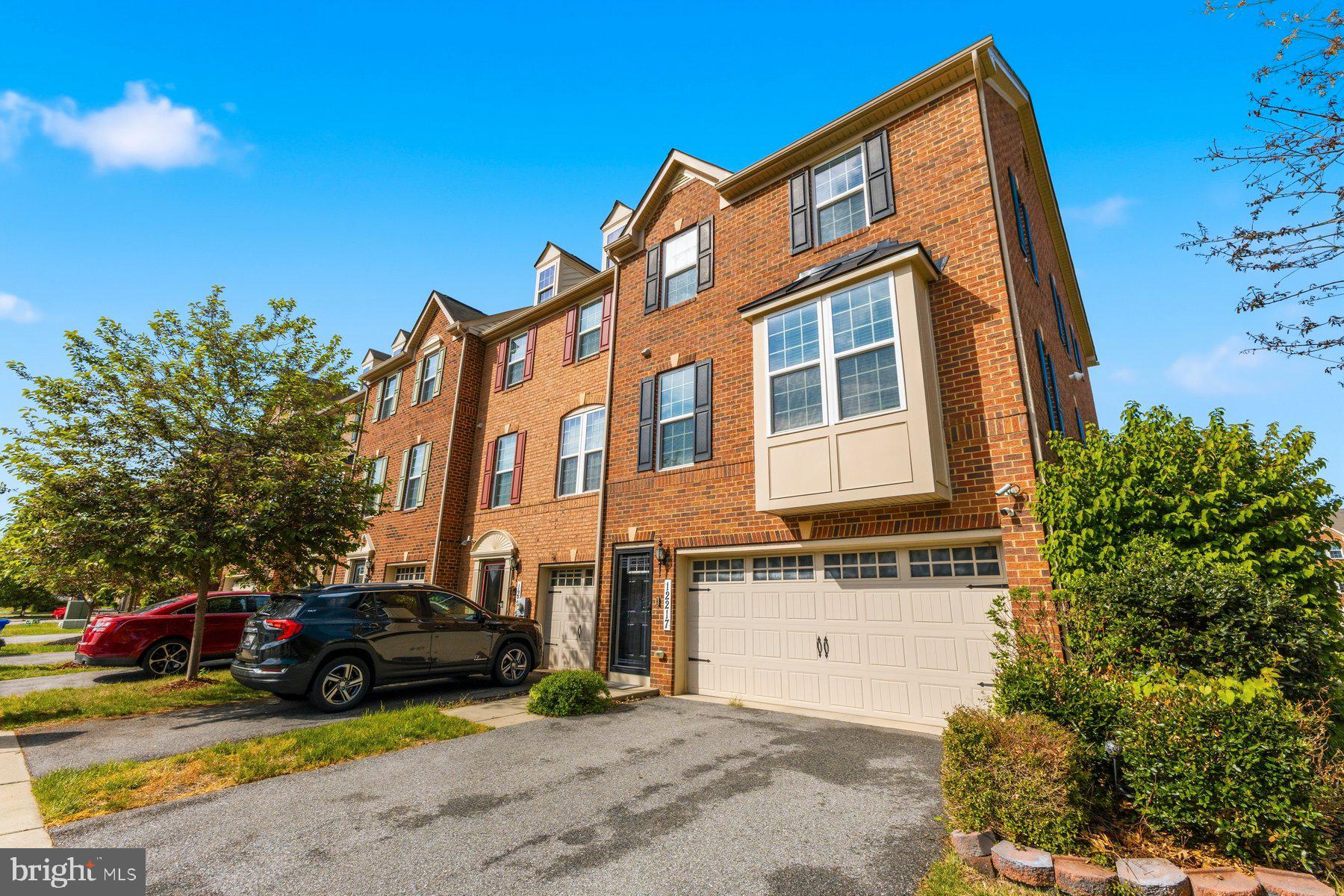 12217 Timberlake Place Waldorf, MD 20601 - Photo 2 of 34 Charming brick townhouse with greenery.