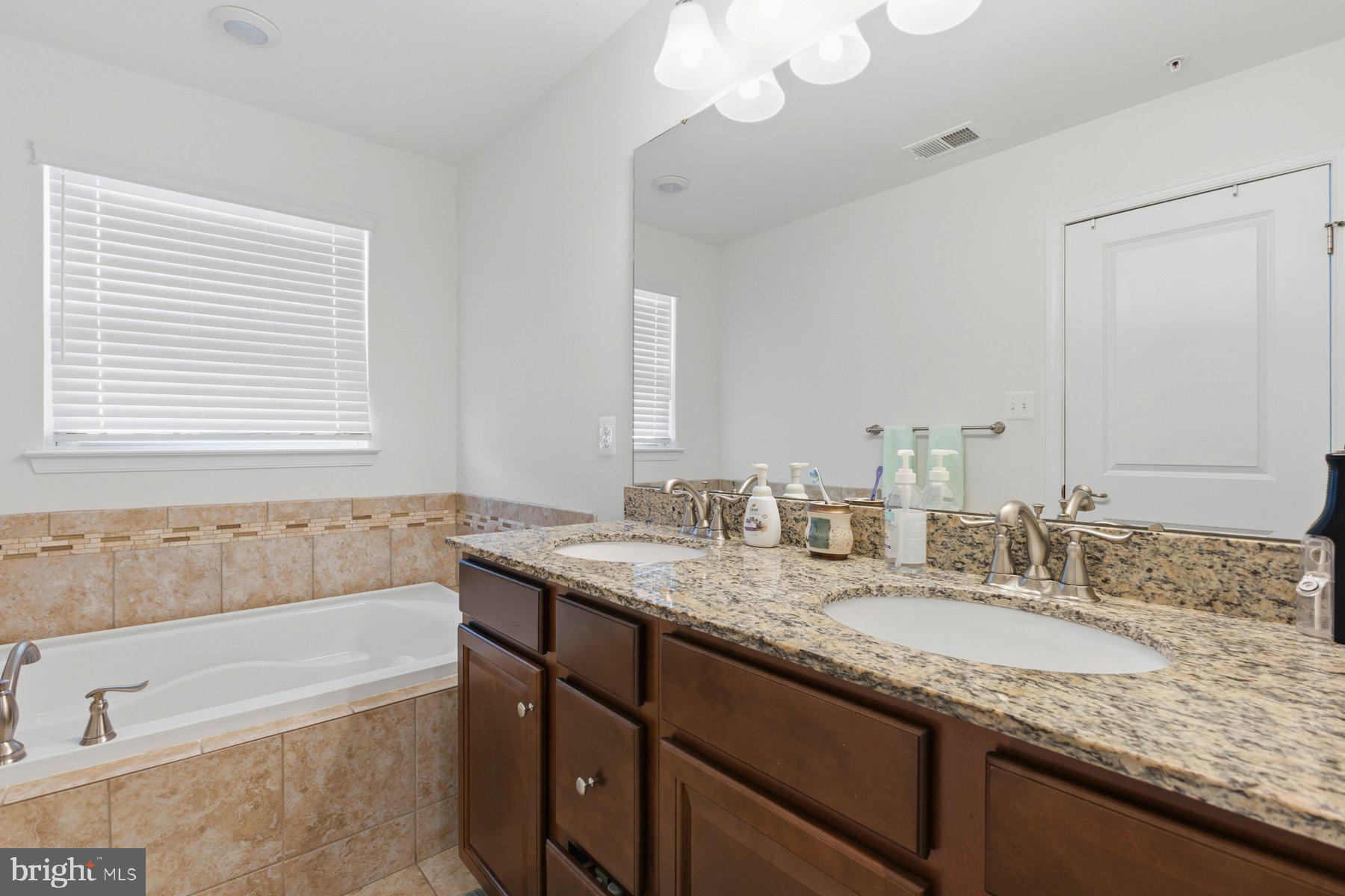 12217 Timberlake Place Waldorf, MD 20601 - Photo 21 of 34 Elegant bathroom with modern finishes.