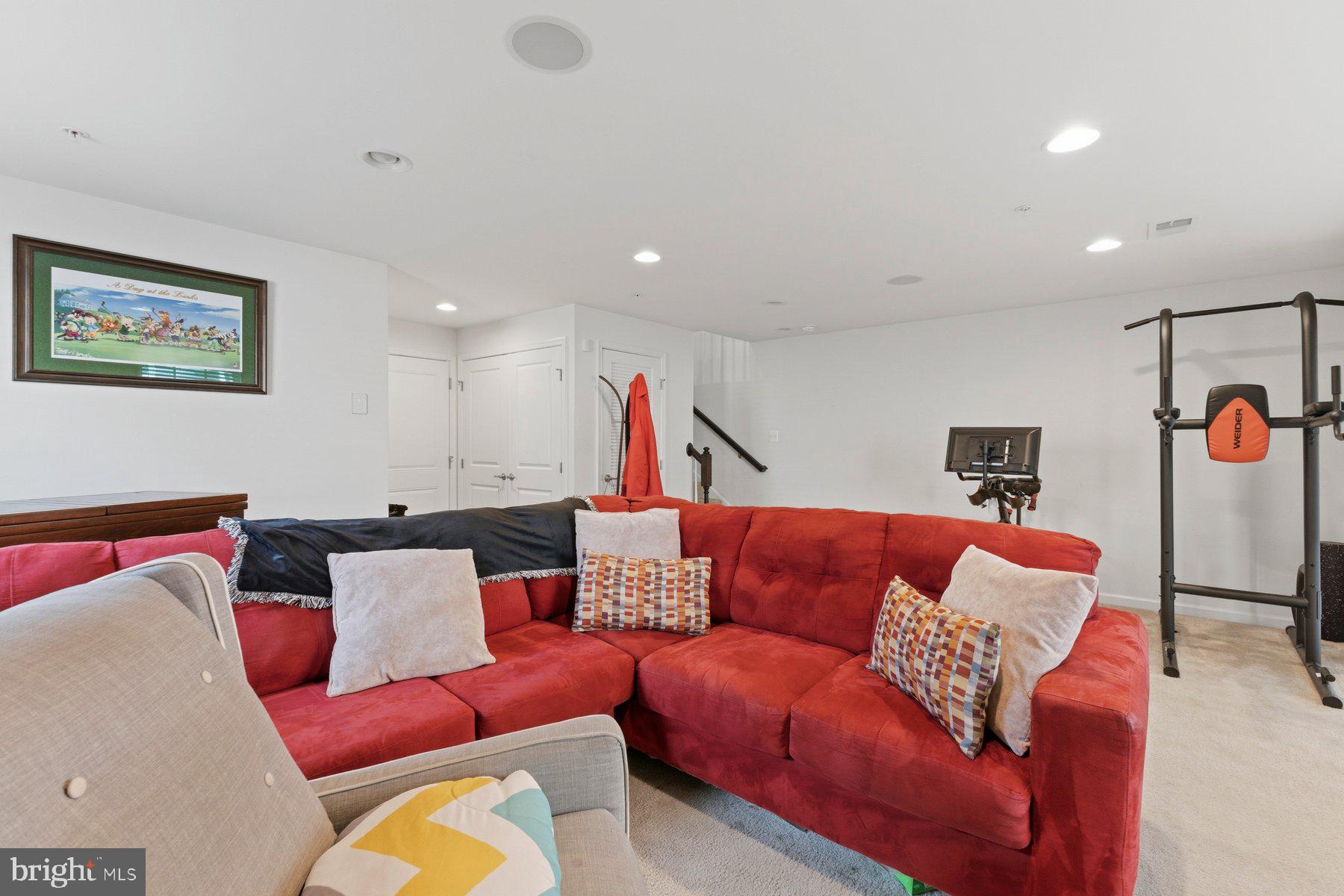 12217 Timberlake Place Waldorf, MD 20601 - Photo 29 of 34 Cozy basement retreat with fitness area.