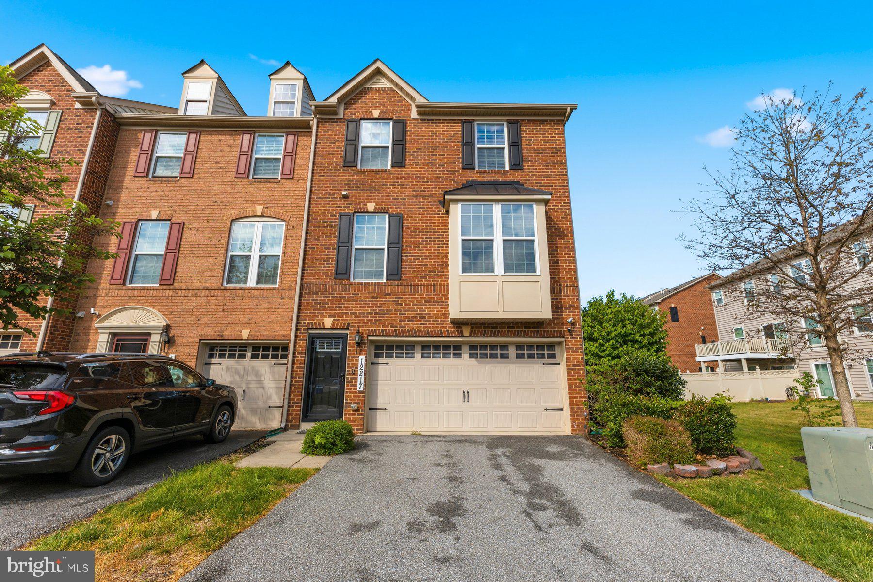 12217 Timberlake Place Waldorf, MD 20601 - Photo 3 of 34 Charming brick townhouse with curb appeal.