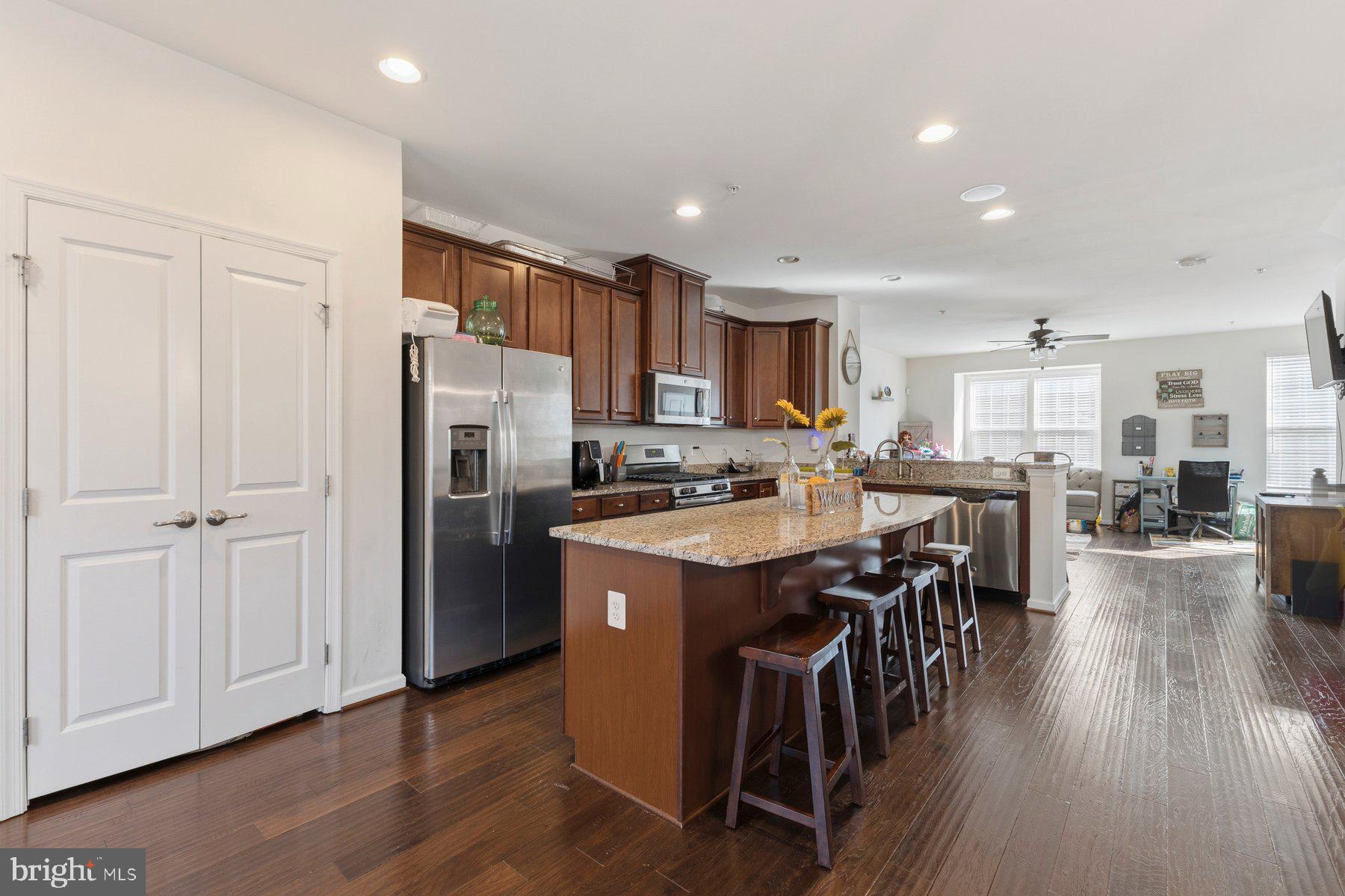 12217 Timberlake Place Waldorf, MD 20601 - Photo 6 of 34 Modern kitchen with warm wood accents.