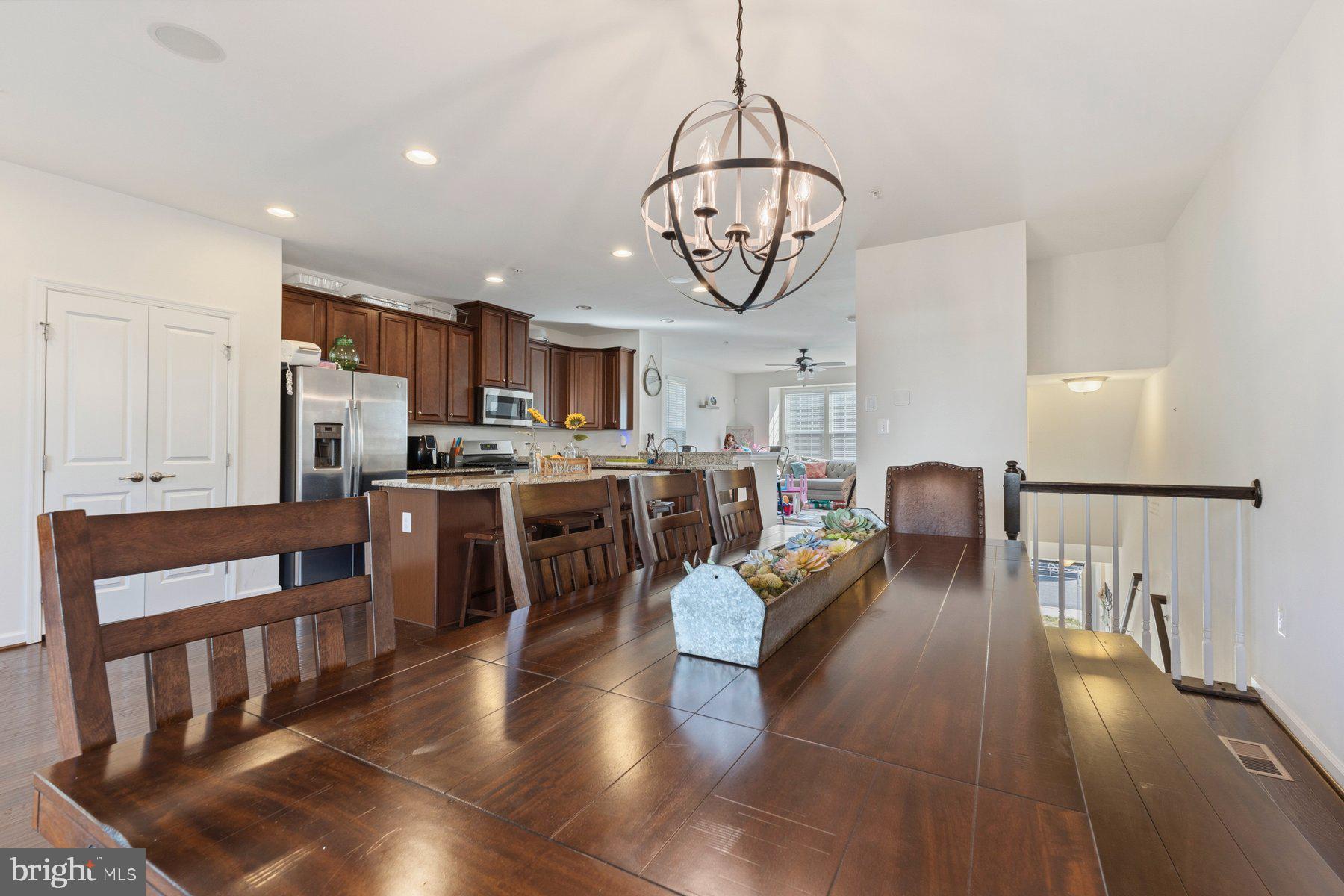 12217 Timberlake Place Waldorf, MD 20601 - Photo 10 of 34 Spacious dining area with modern charm.