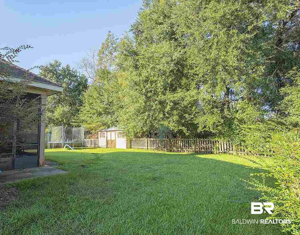 325 J J Michael Street Fairhope, AL 36532 - Photo 24 of 25 BackYard with Storage She