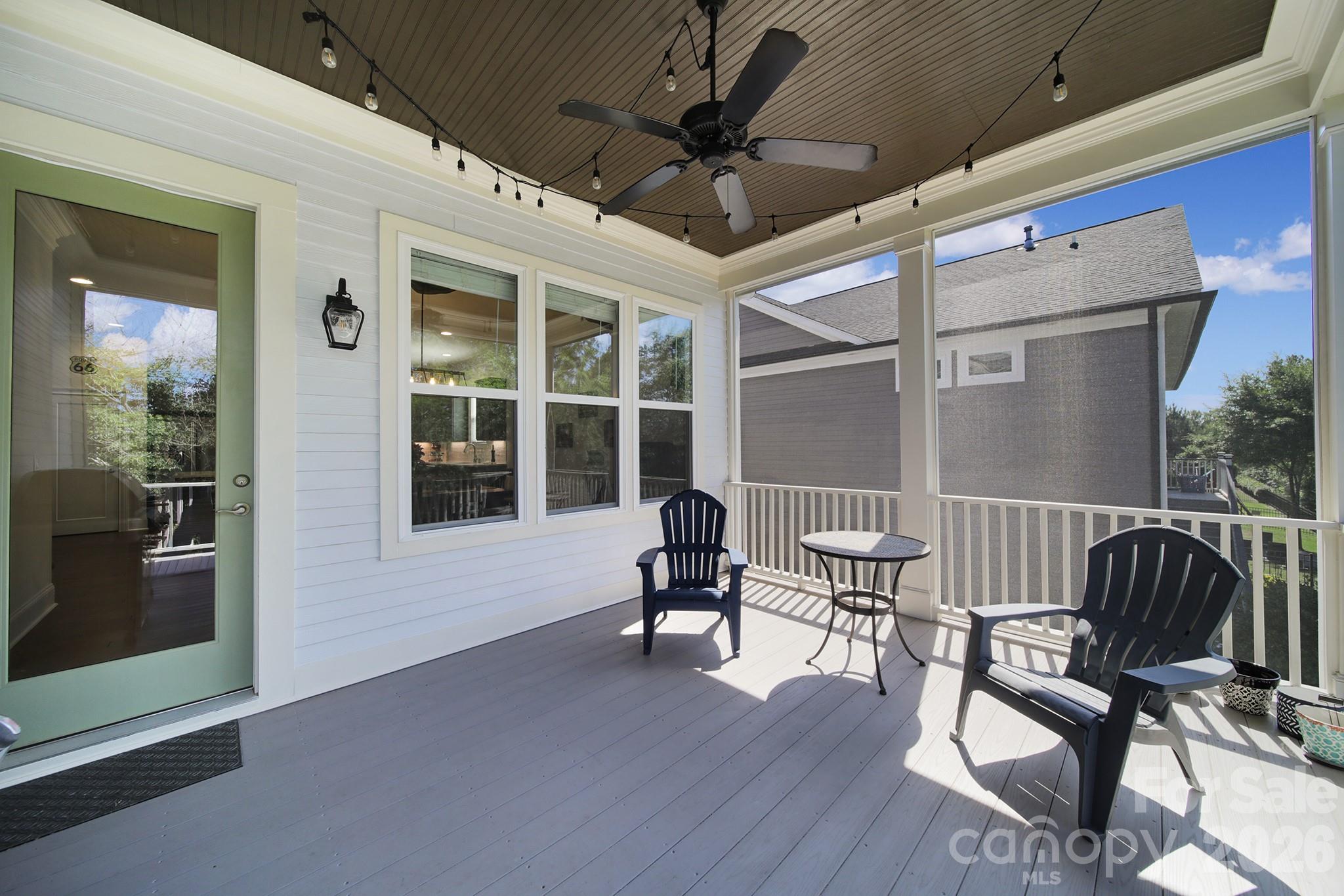 1633 Half Pint Loop Fort Mill, SC 29708 - Photo 28 of 48 a view of a porch with furniture and wooden floor