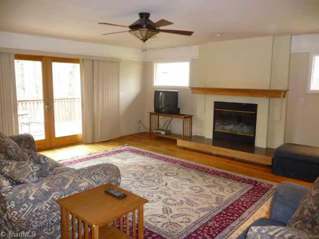 Other. Large great room w/HW floors, FP w/gas logs, ceiling fan, recessed lighting and french doors to deck