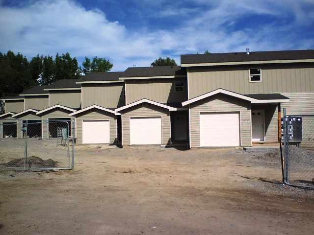 1012 East Avenue, Unit 2 Rifle, CO 81650 - Photo 1 of 2 a view of a house with yard