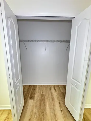 a bathroom with a sink a vanity and mirror