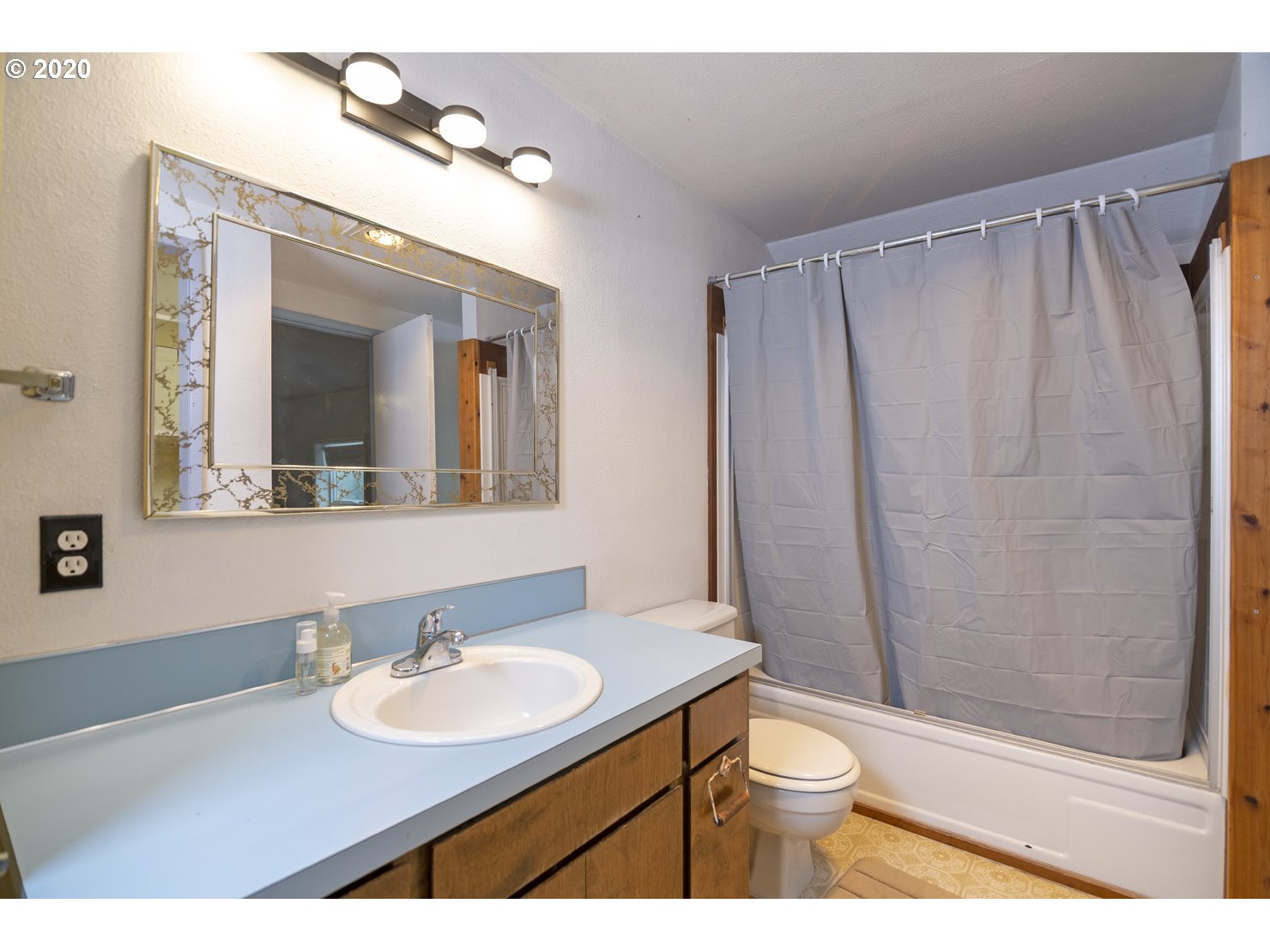 41300 Southwest Laurelwood Road Gaston, OR 97119 - Photo 21 of 29 a bathroom with a sink a toilet and shower
