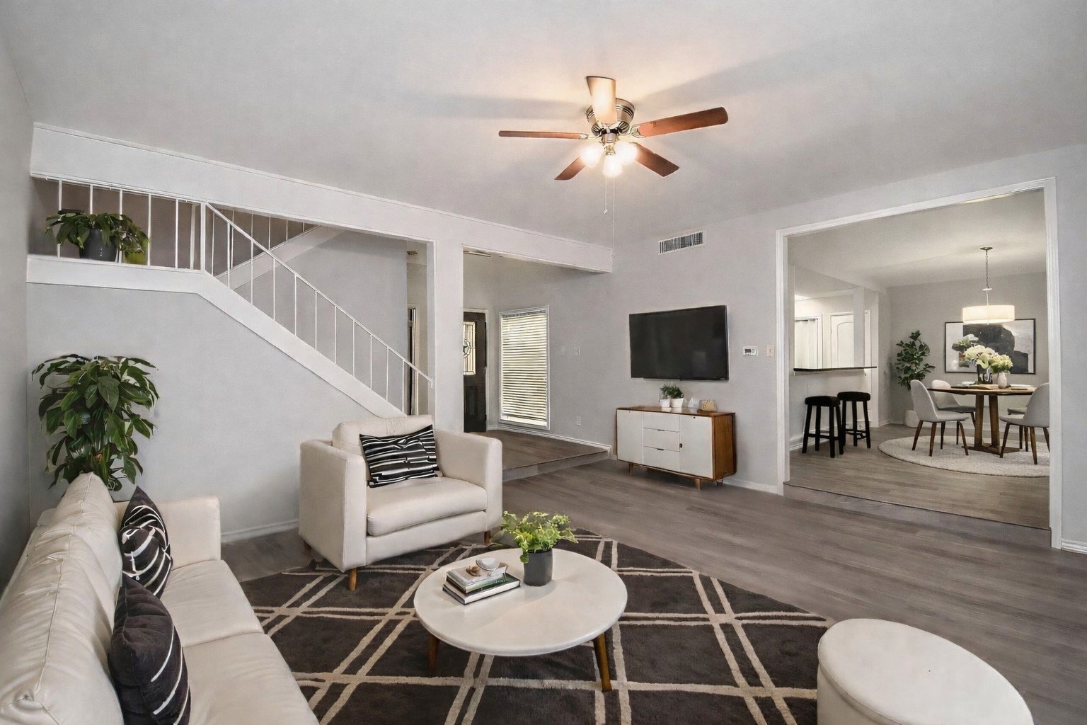 201 Vanderpool Lane, Unit 113 Houston, TX 77024 - Photo 11 of 47 virtually staged living area