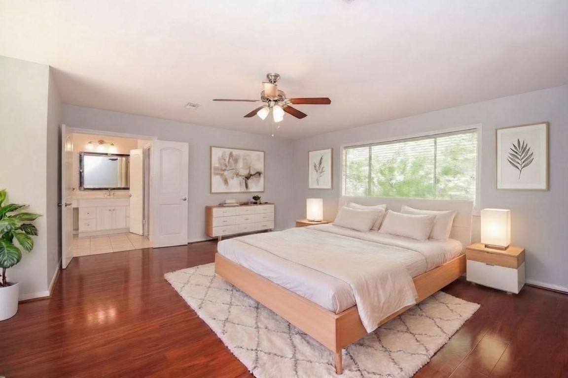 201 Vanderpool Lane, Unit 113 Houston, TX 77024 - Photo 24 of 47 Virtually staged master bedroom