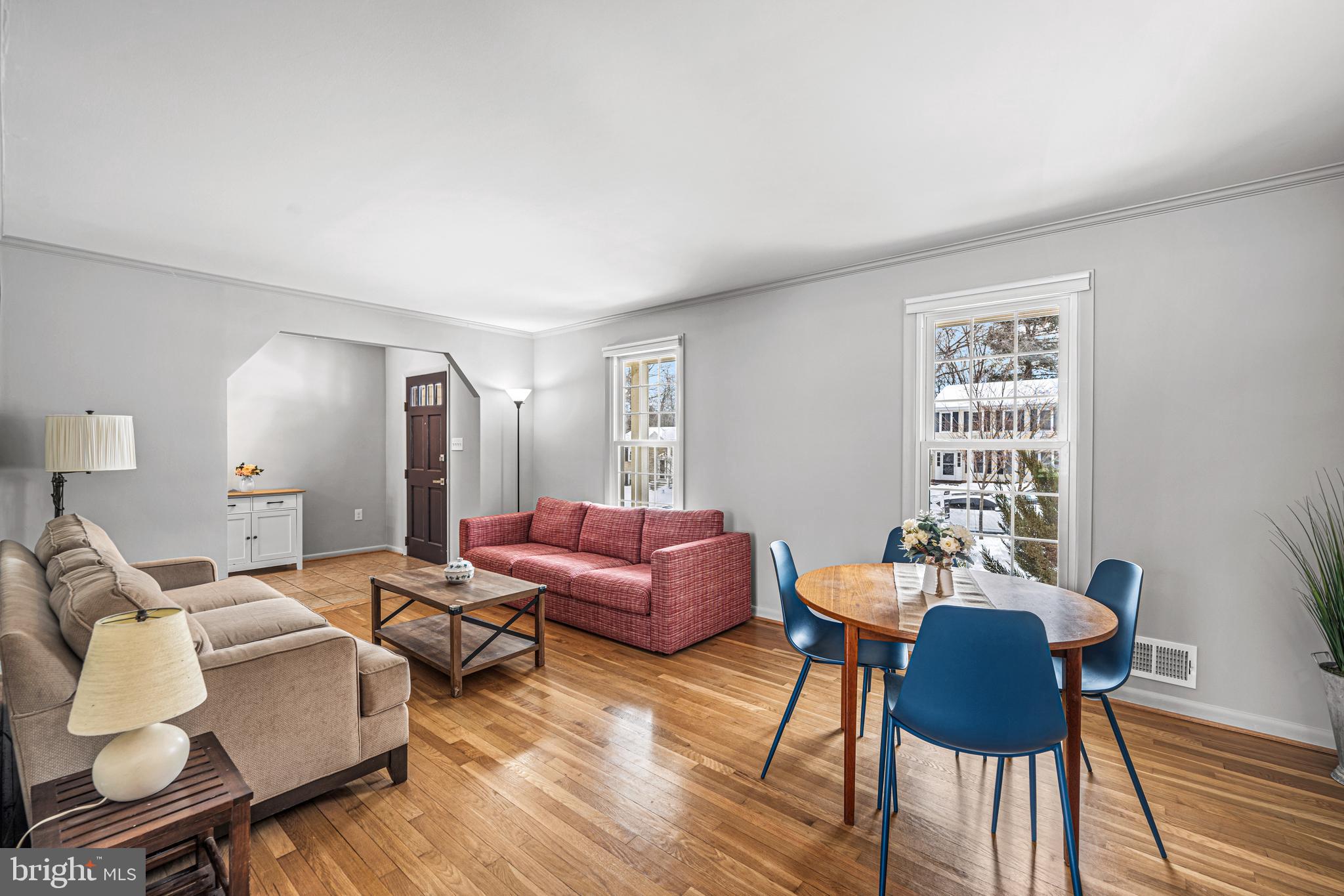 3205 Llewellyn Field Road Olney, MD 20832 - Photo 2 of 39 a living room with furniture and wooden floor