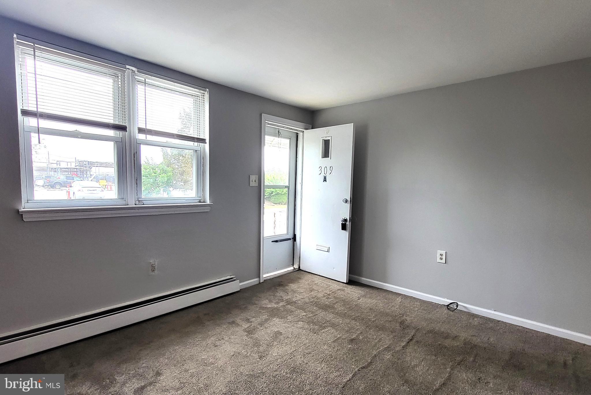 309 Green Street, Unit A Marcus Hook, PA 19061 - Photo 2 of 15 Livingroom