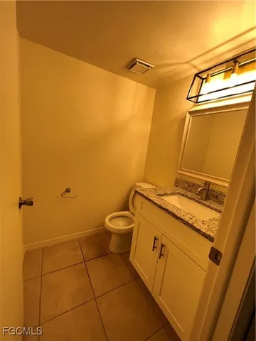 a view of a room with a large window