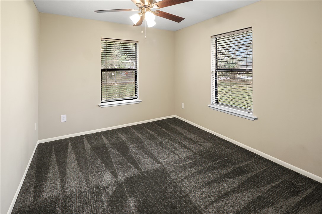 314 Moss Street Bryan, TX 77803 - Photo 9 of 18 a view of an empty room with a window